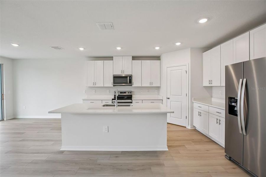 Furnished interior view inside a new home in Two Rivers - Classic Series, Zephyrhills (Image 9).