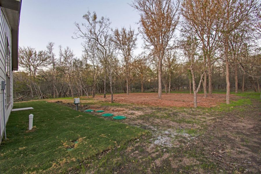 Exterior details and patio area of a home in , Bastrop (Image 25).
