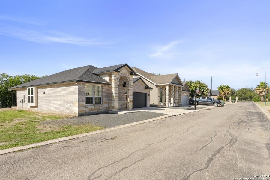 Front exterior of a new home in , Uvalde, TX, highlighting curb appeal (Image 21). Front exterior of a new home in , Uvalde, TX, highlighting curb appeal (Image 21).
