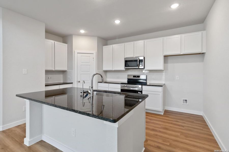 Furnished interior view inside a new home in Red Hawk Landing, San Antonio (Image 10).