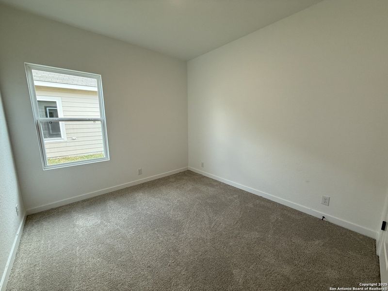 Spacious, unfurnished interior of a new home in Enclave at Hennersby Hollow 50's, San Antonio (Image 26).