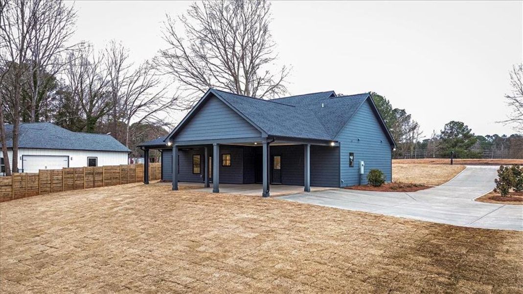 Front exterior of a new home in , Monroe, GA, highlighting curb appeal (Image 23).