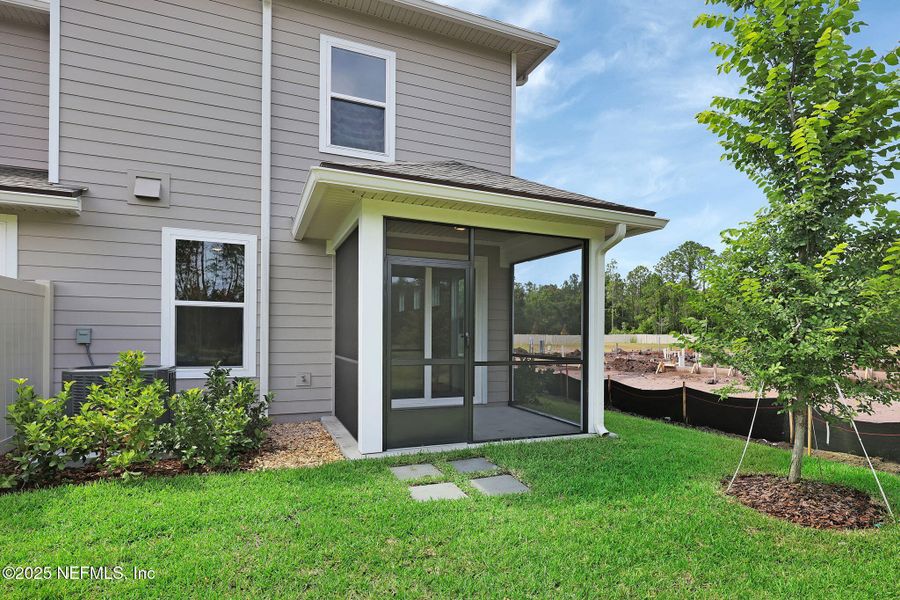 Exterior details and patio area of a home in Woodland Park, Ponte Vedra (Image 29).