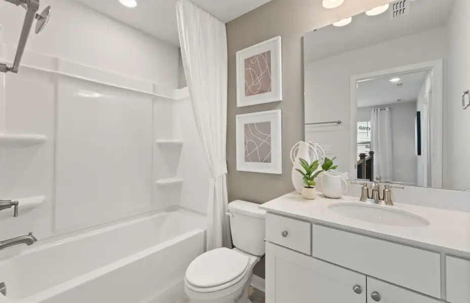 Furnished interior view inside a new home in Huxley, Apex (Image 10).