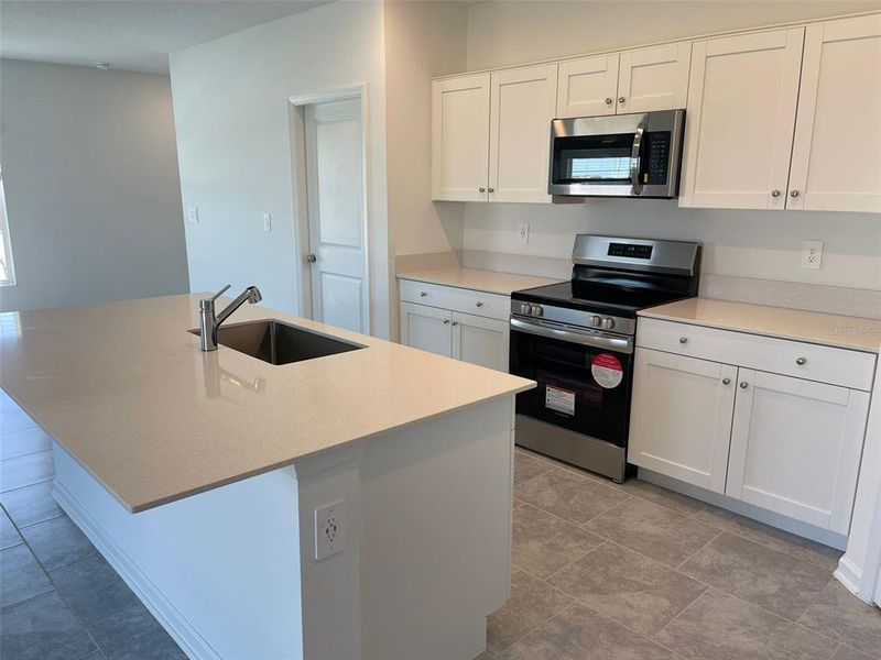 Furnished interior view inside a new home in Lawson Dunes, Haines City (Image 9).
