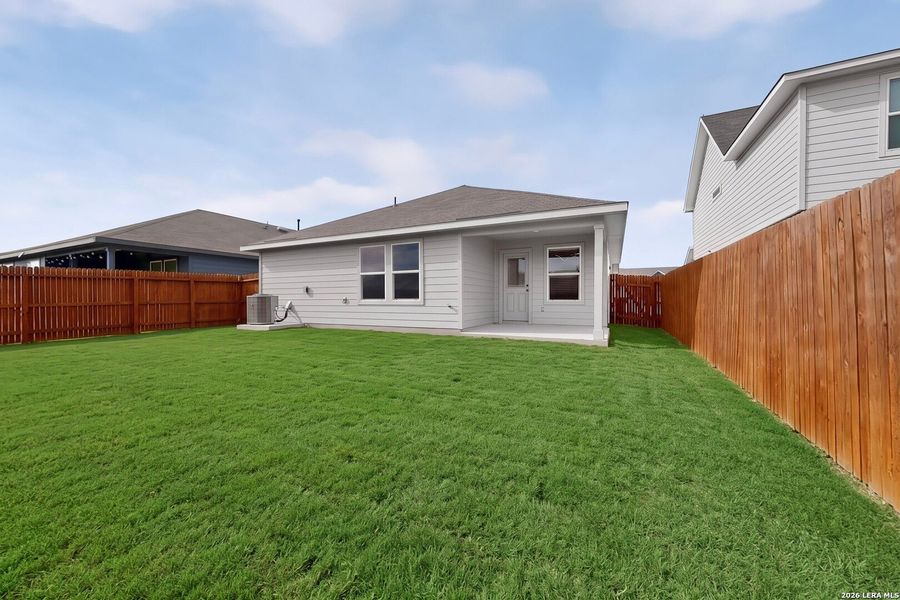 Exterior details and patio area of a home in Saengerhalle Meadows, New Braunfels (Image 4).