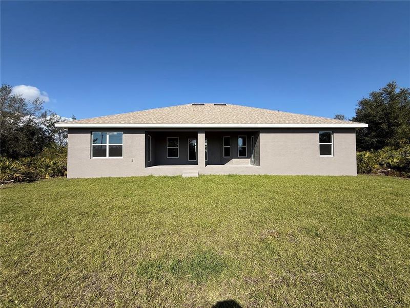 Exterior details and patio area of a home in , Port Charlotte (Image 16).