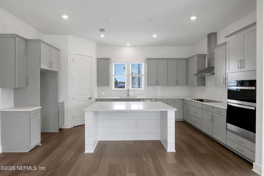 Furnished interior view inside a new home in North Beach Townhomes, Jacksonville Beach (Image 9).