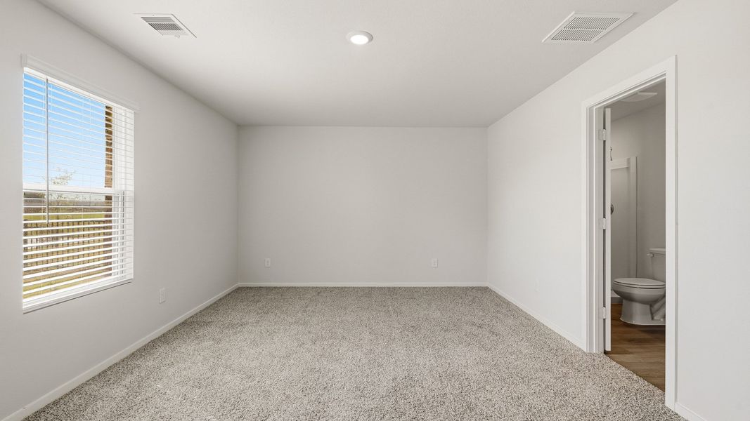 Spacious, unfurnished interior of a new home in Sunterra, Katy (Image 18).