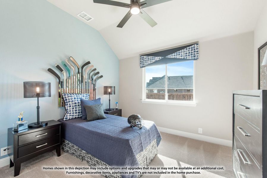 Kids bedroom with vaulted ceiling, ceiling fan, and hockey stick headboard on blue bed Kids bedroom with vaulted ceiling, ceiling fan, and hockey stick headboard on blue bed