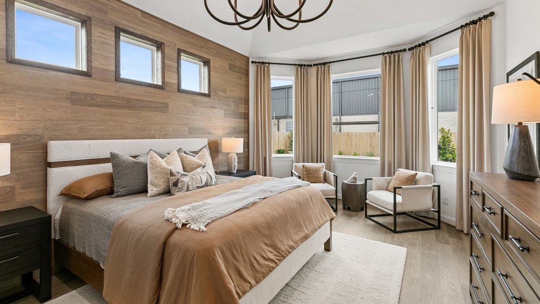 Representative furnished interior of a home built from the Magnolia by Brightland Homes in Sunterra, Katy (Image 11).