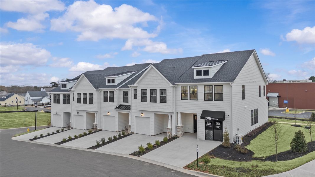 Front exterior of a new home in Gresham Station, Simpsonville, SC, highlighting curb appeal (Image 21).