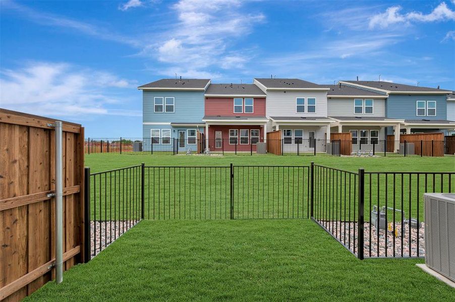 Exterior details and patio area of a home in Providence Commons, Providence Village (Image 20).