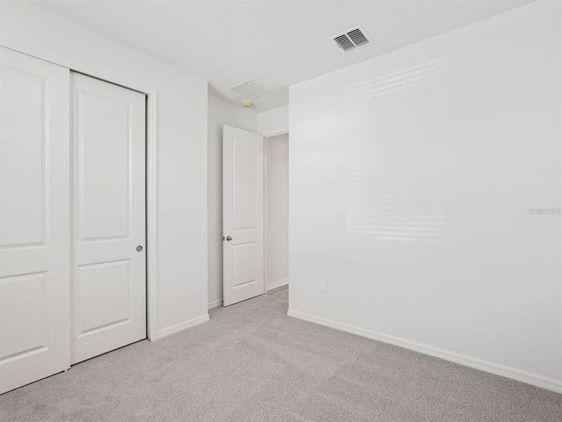 Spacious, unfurnished interior of a new home in Coasterra - Reserve Series, Palmetto (Image 31).