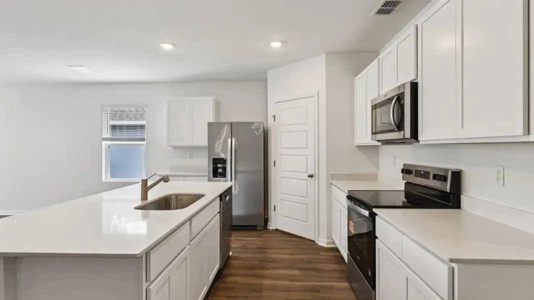 Furnished interior view inside a new home in Cascades, Davenport (Image 6).