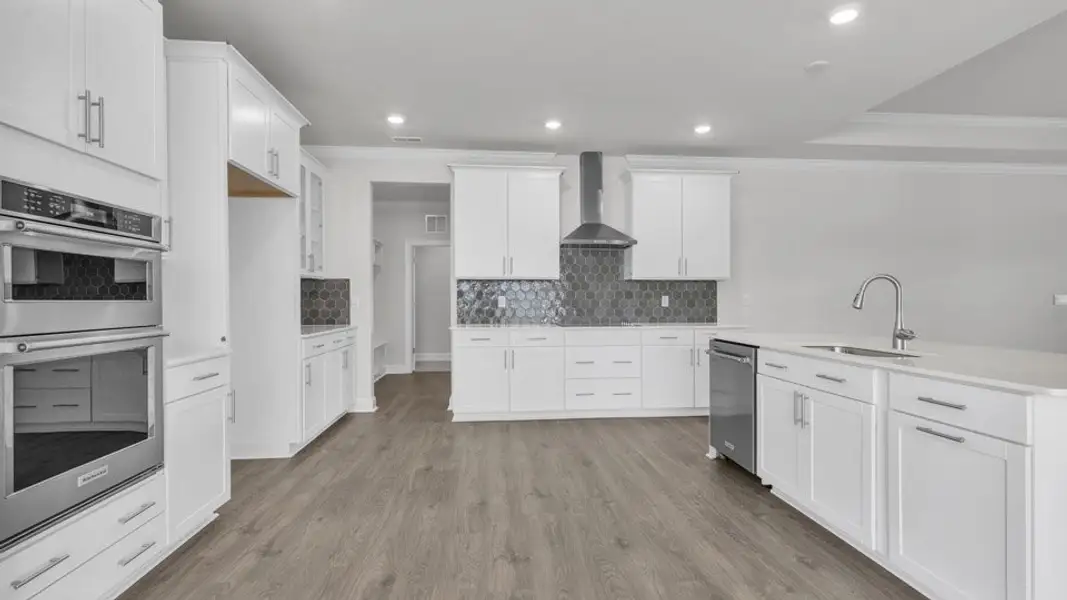 Representative furnished interior of a home built from the KATHRYN by D.R. Horton in Eagle Creek, Fuquay Varina (Image 5).
