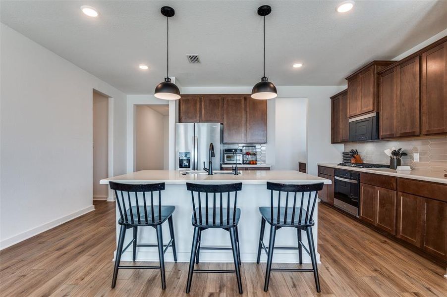 Furnished interior view inside a new home in Prairie Ridge at Goodland, Venus (Image 10).