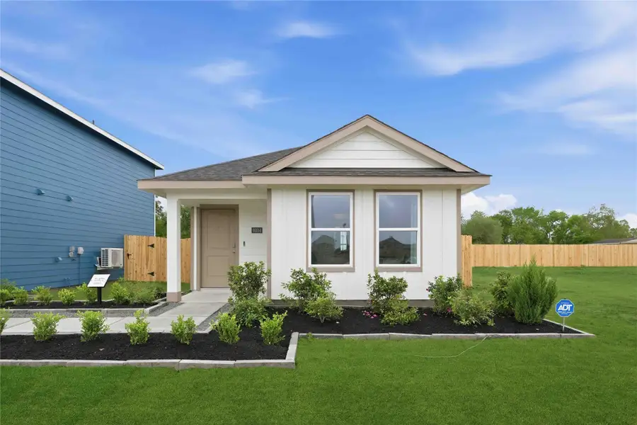 Front exterior of a new home in Pineapple Square, Houston, TX, highlighting curb appeal (Image 1). Front exterior of a new home in Pineapple Square, Houston, TX, highlighting curb appeal (Image 1).