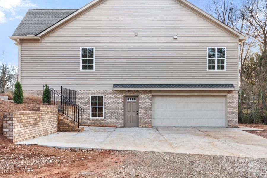Front exterior of a new home in , Winston-Salem, NC, highlighting curb appeal (Image 22). Front exterior of a new home in , Winston-Salem, NC, highlighting curb appeal (Image 22).
