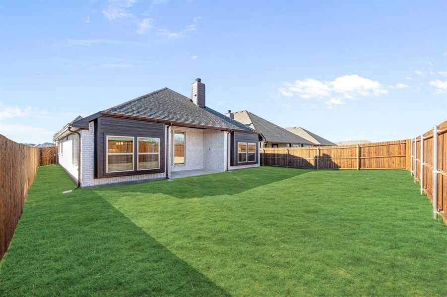 Exterior details and patio area of a home in Georgetown at Kings Fort, Kaufman (Image 3).