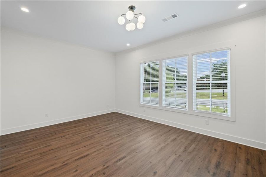 Spacious, unfurnished interior of a new home in Devin's Shire - A Kennesaw Tradition, Kennesaw (Image 33).