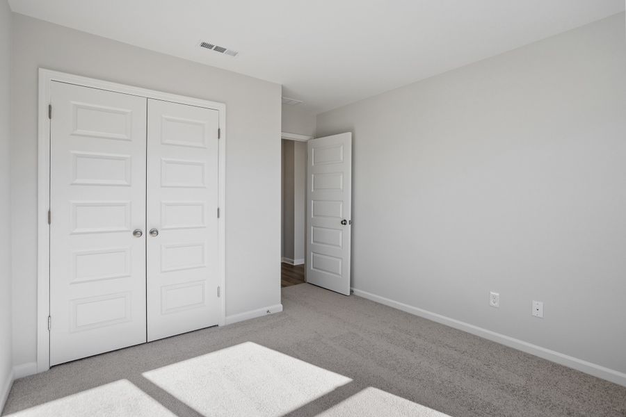 Spacious, unfurnished interior of a new home in Renaissance at White Oak, Garner (Image 28).