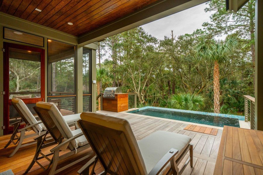 Exterior details and patio area of a home in , Johns Island (Image 30).