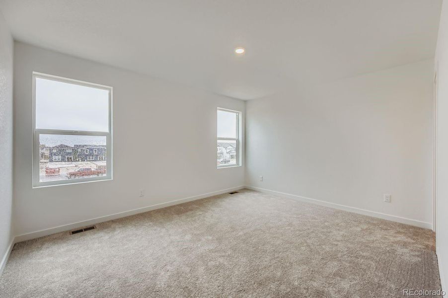 Spacious, unfurnished interior of a new home in Copper Chase: The Celestial Collection, Colorado Springs (Image 11).