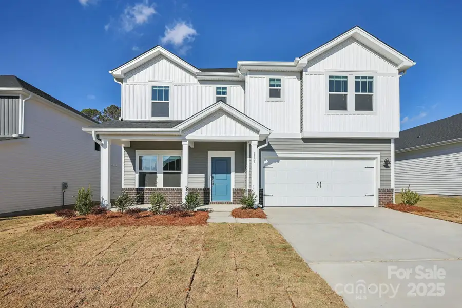 Front exterior of a new home in Oxford Station, Salisbury, NC, highlighting curb appeal (Image 1).