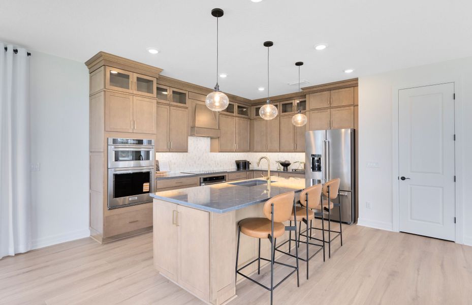 Representative furnished interior of a home built from the Serena 3-Car by Pulte Homes in Two Rivers, Zephyrhills (Image 25).
