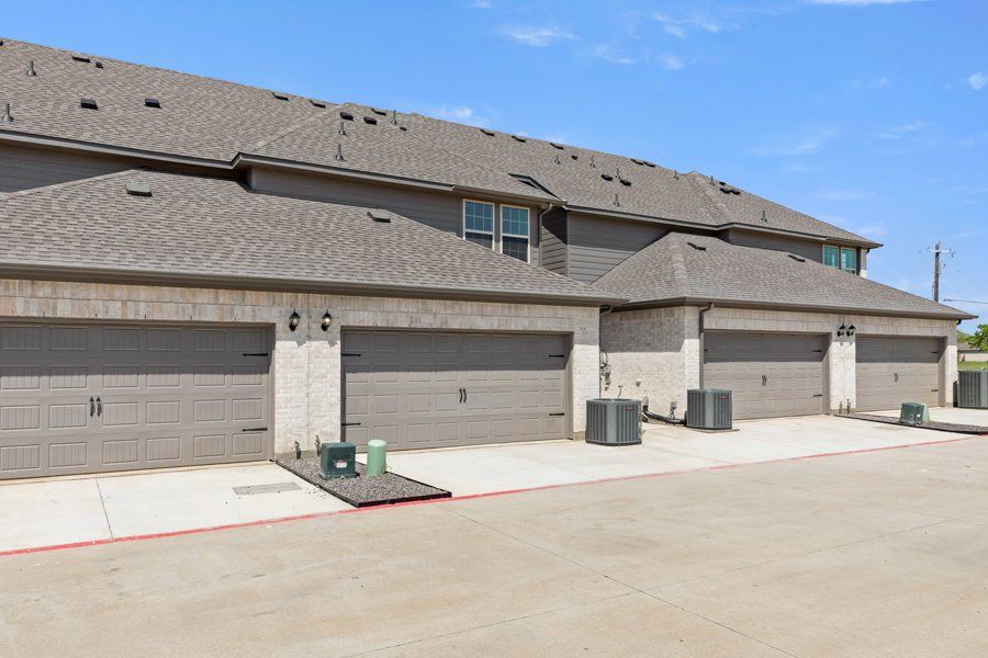 Front exterior of a new home in Sanger Circle, Sanger, TX, highlighting curb appeal (Image 25). Front exterior of a new home in Sanger Circle, Sanger, TX, highlighting curb appeal (Image 25).