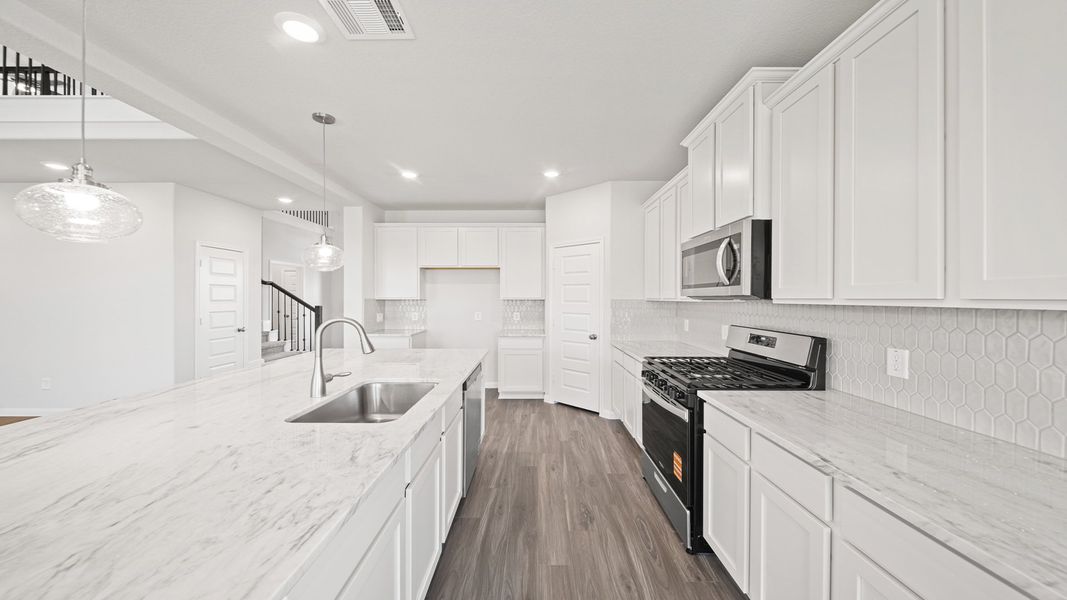Representative furnished interior of a home built from the The Summit by Legend Homes in Bluestem, Brookshire (Image 7).