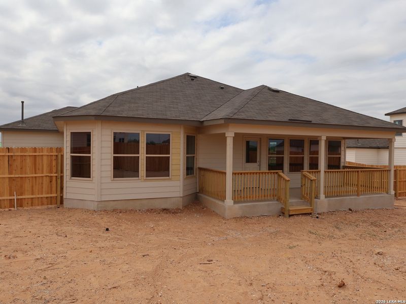 Exterior details and patio area of a home in Hickory Ridge, Elmendorf (Image 3).