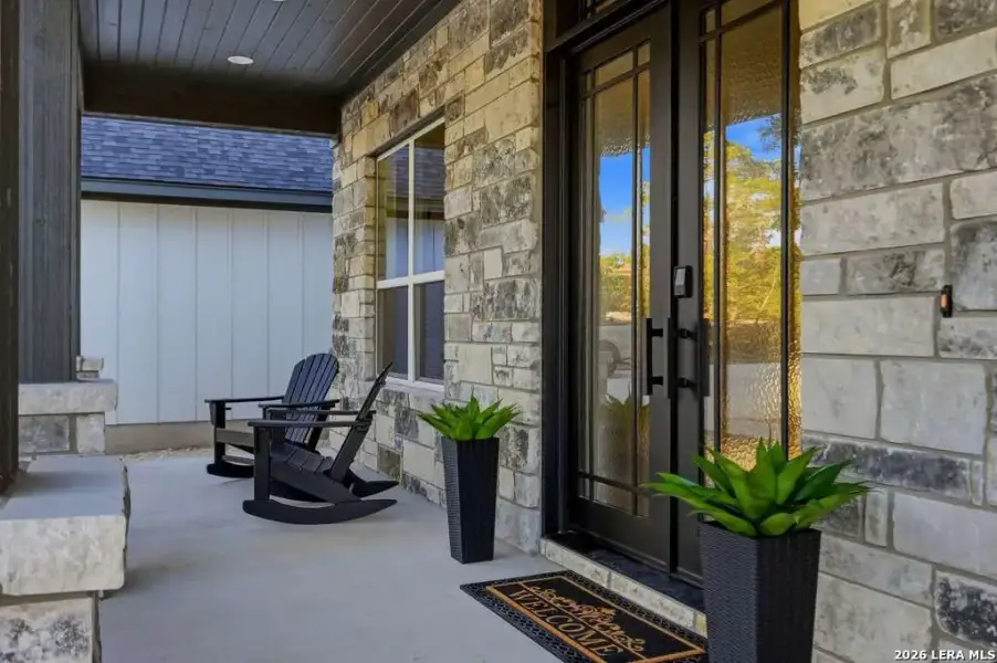 Exterior details and patio area of a home in , Fischer (Image 25).