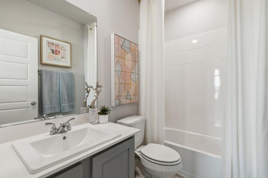 Bathroom in the Winters home plan by Trophy Signature Homes – REPRESENTATIVE PHOTO