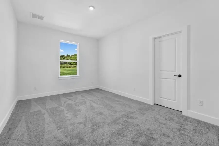 Spacious, unfurnished interior of a new home in Travisso, Leander (Image 22).