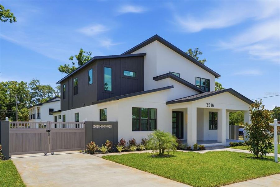 Front exterior of a new home in , St. Petersburg, FL, highlighting curb appeal (Image 34). Front exterior of a new home in , St. Petersburg, FL, highlighting curb appeal (Image 34).