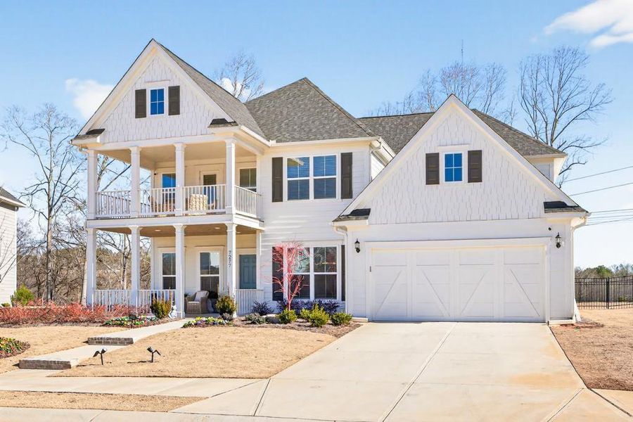 Front exterior of a new home in Reunion, Flowery Branch, GA, highlighting curb appeal (Image 24).