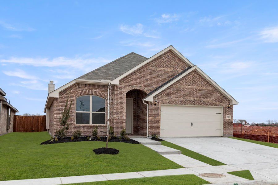 Representative exterior photo of a completed home built from the Kingston by Impression Homes in Timberbrook, Justin, TX (Image 2).
