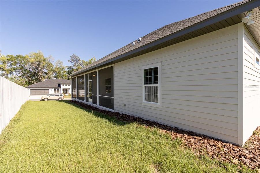 Front exterior of a new home in South Pointe, Gainesville, FL, highlighting curb appeal (Image 19).