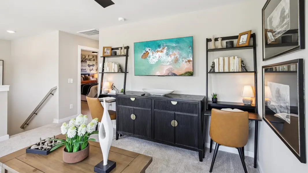 Loft Area with view of secondary bedrooms and staircase