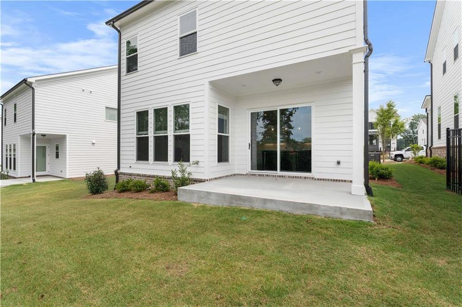 Front exterior of a new home in Palisades Single Family, Cumming, GA, highlighting curb appeal (Image 38).