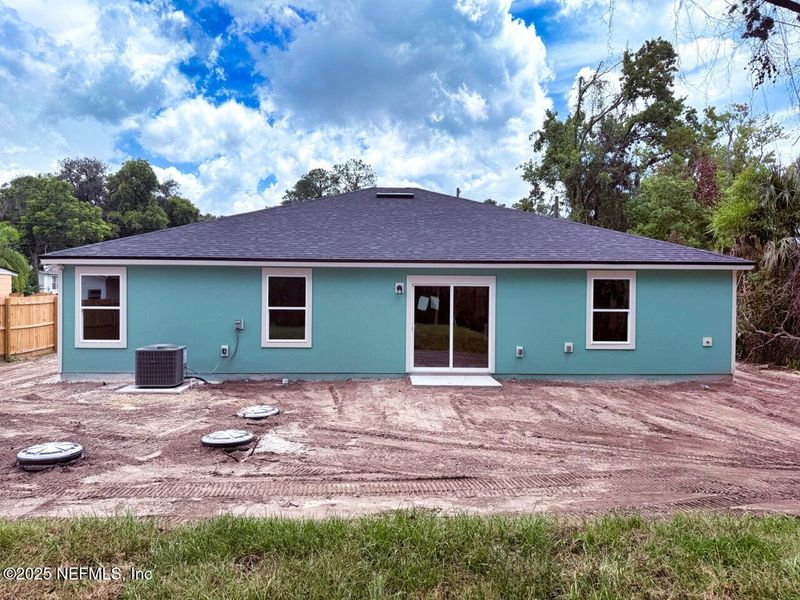 Front exterior of a new home in , Jacksonville, FL, highlighting curb appeal (Image 8).