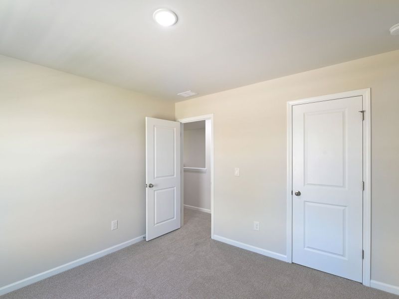 Spacious, unfurnished interior of a new home in Oakwood, Mebane (Image 24).