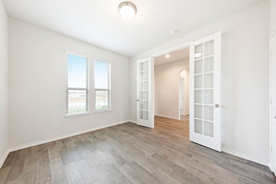 Representative exterior photo of a completed home built from the Radcliffe II by Impression Homes in Stone Eagle, Azle, TX (Image 9).