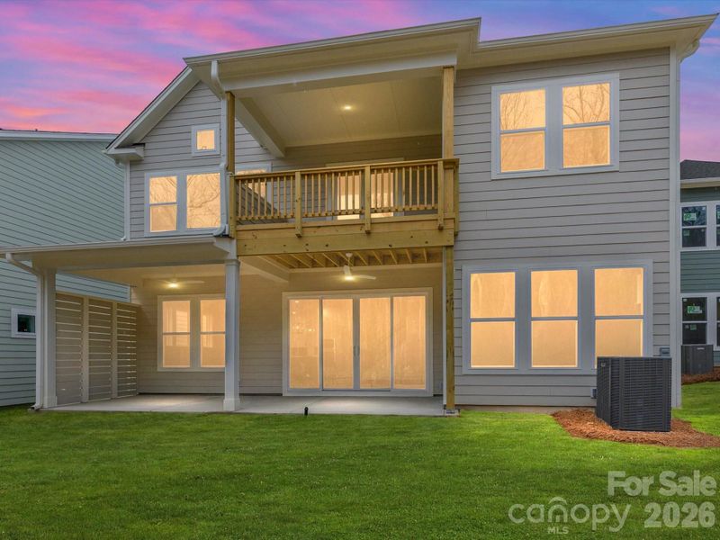 Exterior details and patio area of a home in North Creek Village, Huntersville (Image 4).