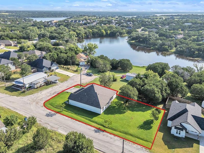 Front exterior of a new home in , Granbury, TX, highlighting curb appeal (Image 25). Front exterior of a new home in , Granbury, TX, highlighting curb appeal (Image 25).