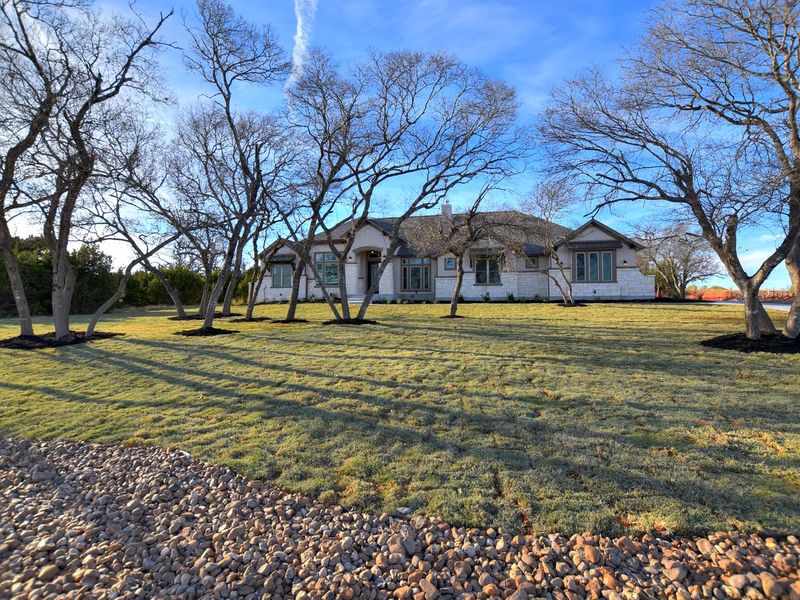 Representative exterior photo of a completed home built from the Coronado I by Giddens Homes in Clearwater Ranch, Liberty Hill, TX (Image 39).