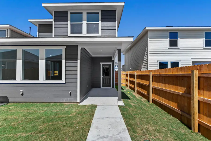 Exterior details and patio area of a home in Valverde, Bastrop (Image 3).