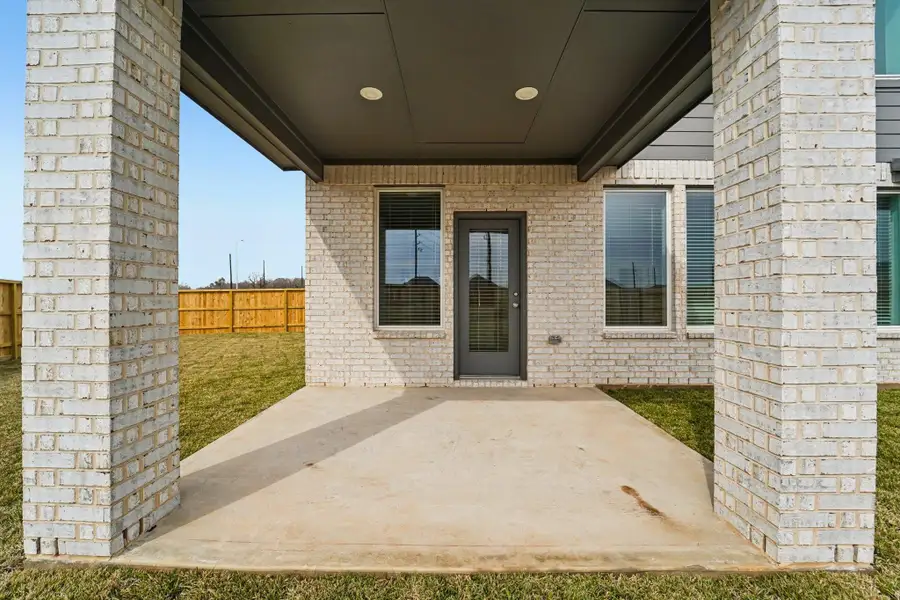 Exterior details and patio area of a home in Kingdom Heights, Rosenberg (Image 4).